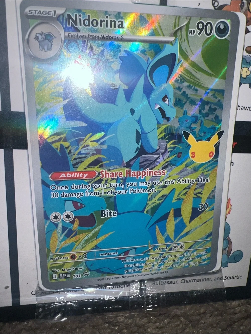 Pokemon Nidorina Holofoil Card — Blue and Yellow Accents